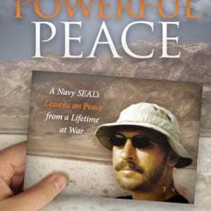 Book cover of Powerful Peace: A Navy SEAL’s Lessons on Peace from a Lifetime at War by J. Robert DuBois, showing a desert mountain background and a hand holding a photo of a bearded man in sunglasses and a bucket hat.